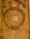 Carving of Sun with a fringe on Building in Lisbon Portugal